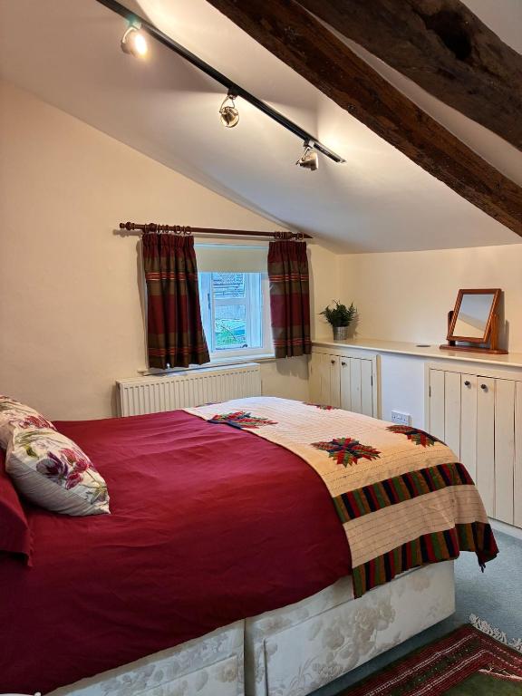Peaceful double bedroom beneath the eaves